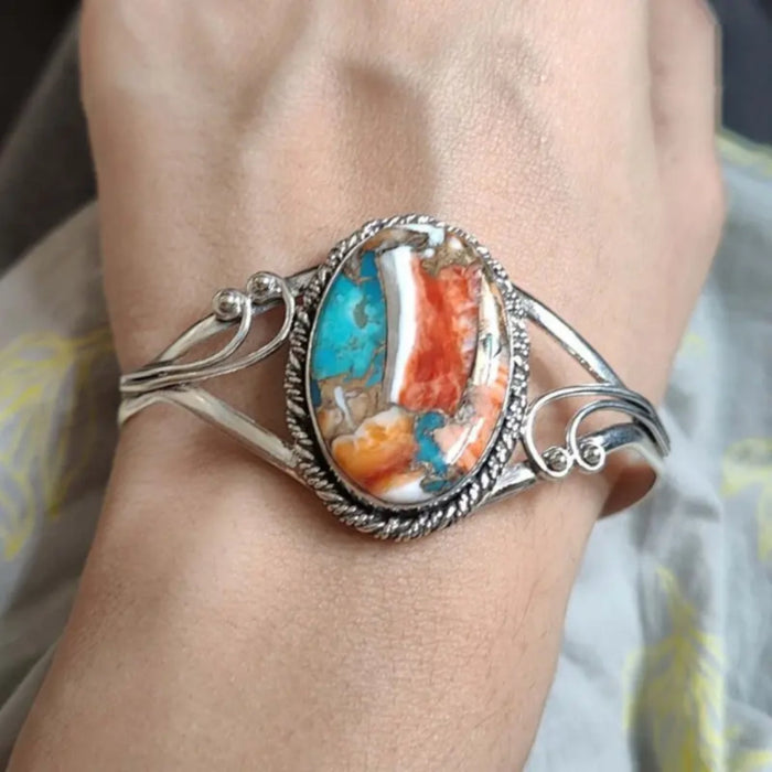 Bracelet with Inlaid Luminous Gemstone Design