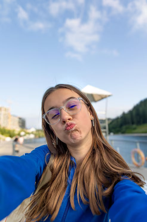files/teen-girl-duckface-selfie-by-water-playful-youth-vibe_169016-69571.avif
